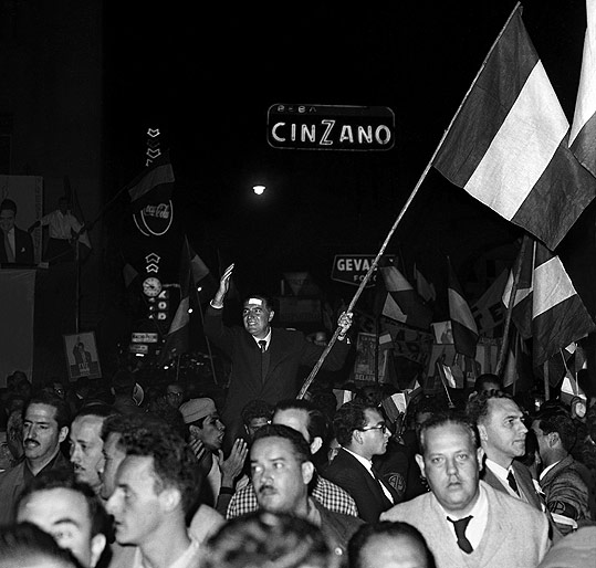 Belaunde with Peruvian flag.